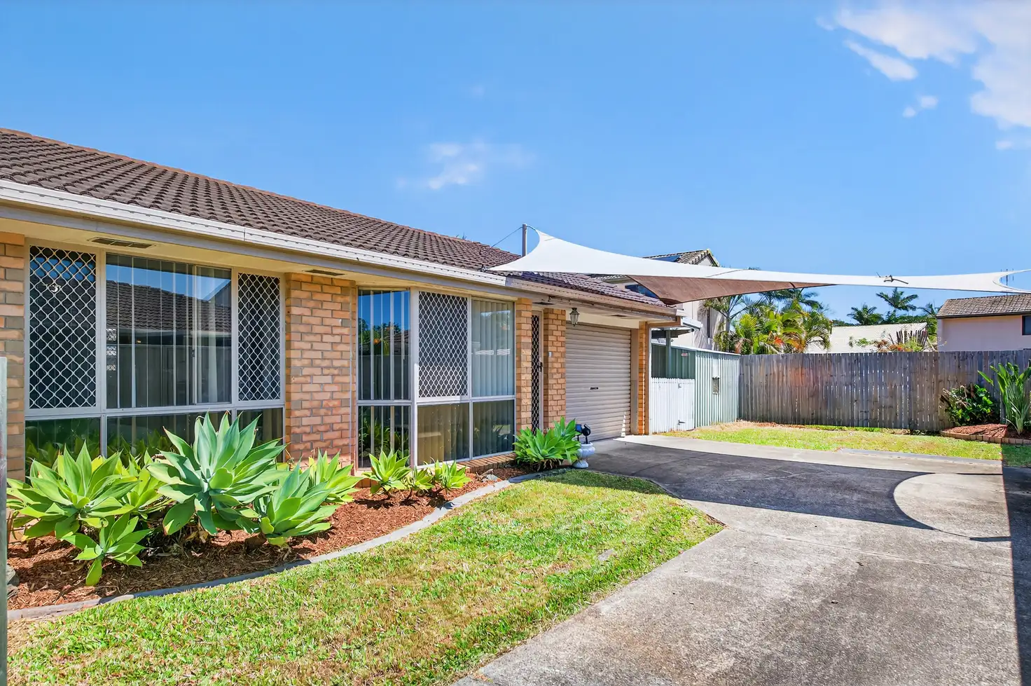 Main view of Homely semi-detached listing, 2/8 Riccarton Place, Labrador QLD 4215