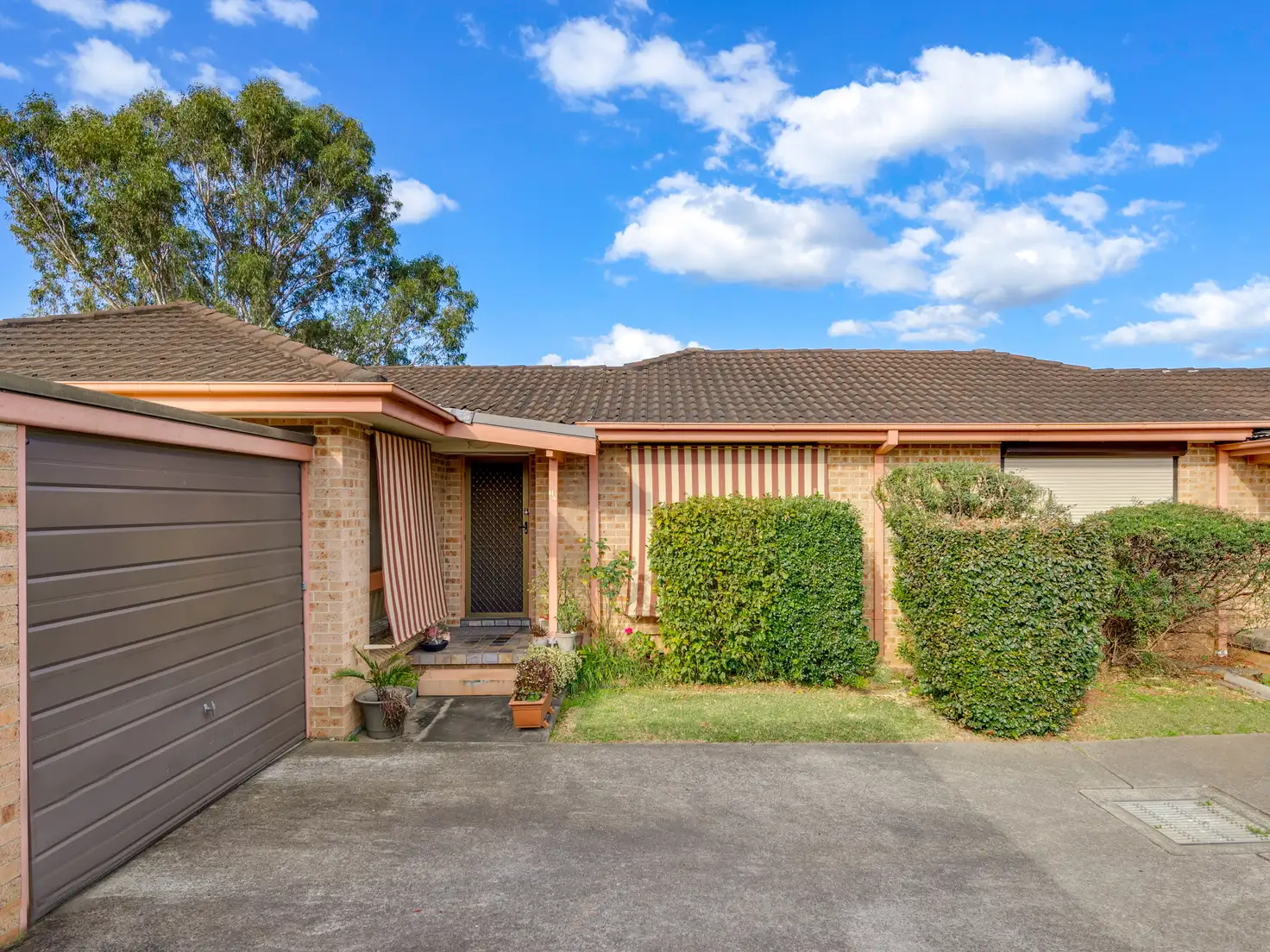 Main view of Homely villa listing, 10/65 Fuchsia Crescent, Macquarie Fields NSW 2564
