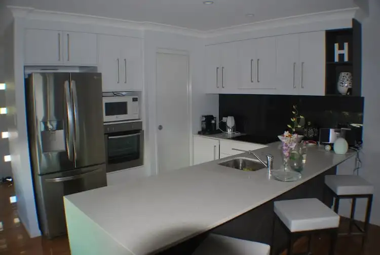 Second view of Homely townhouse listing, 2/13 MAHOGANY WAY, Lammermoor QLD 4703