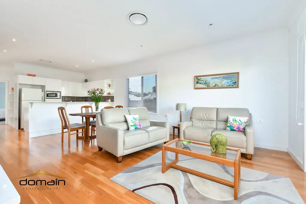 Main view of Homely villa listing, 4/253-255 Booker Bay Road, Ettalong Beach NSW 2257