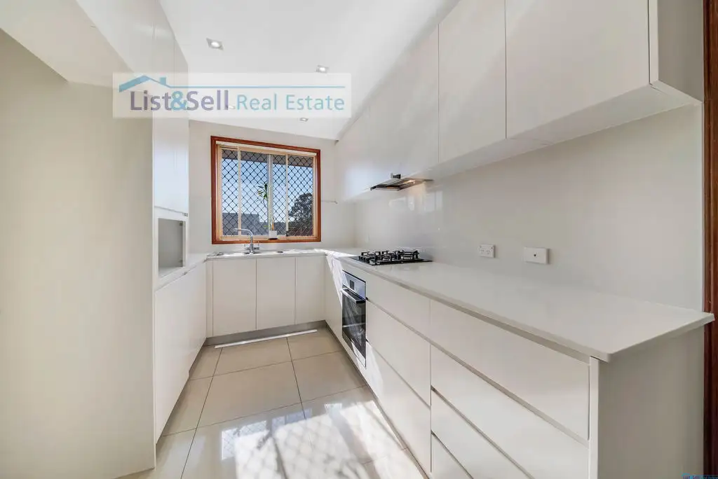 Main view of Homely villa listing, 8/19 Azalea Place, Macquarie Fields NSW 2564