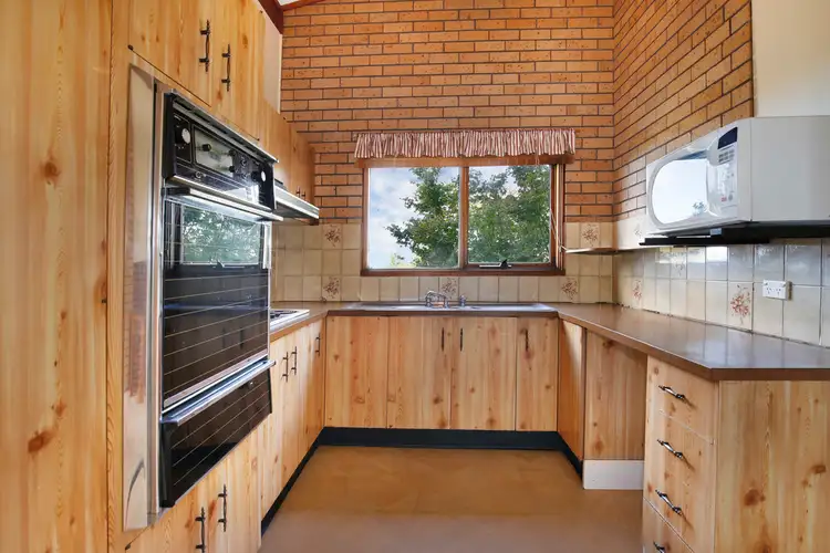 Third view of Homely townhouse listing, 1/8A Northwood Road, Mount Ousley NSW 2519