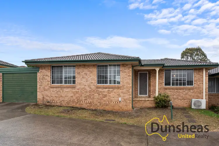 Main view of Homely villa listing, 4/10 Bensley Road, Macquarie Fields NSW 2564
