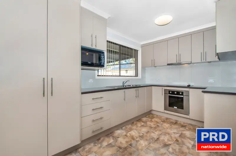 Main view of Homely villa listing, 1/26 Horsley Drive, Horsley NSW 2530