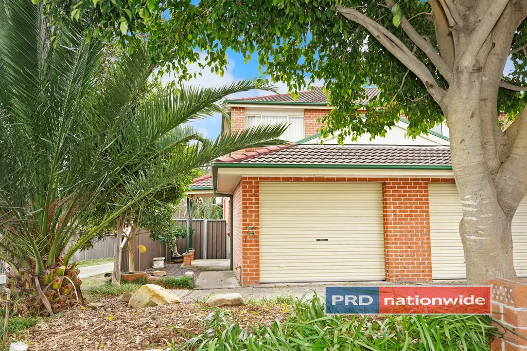 Main view of Homely townhouse listing, 1/65 Newham Drive, Cambridge Gardens NSW 2747