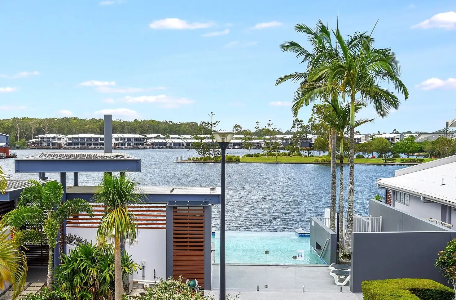Main view of Homely townhouse listing, 13/181 Lae Drive, Coombabah QLD 4216
