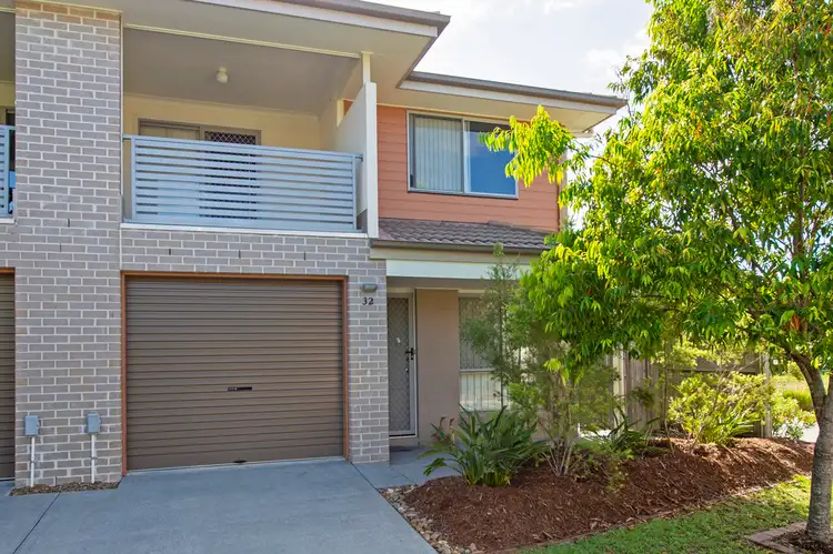 Main view of Homely townhouse listing, 32/131 McAuley Parade, Pacific Pines QLD 4211
