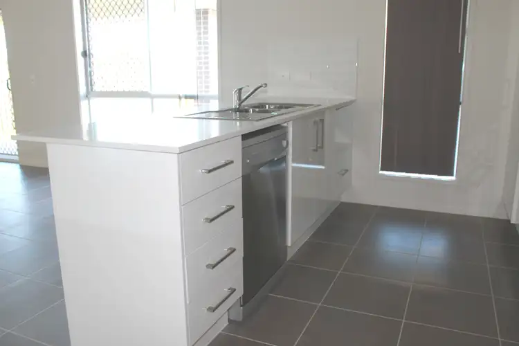 Third view of Homely house listing, 27 KOOLIVOO PARADE, Boyne Island QLD 4680