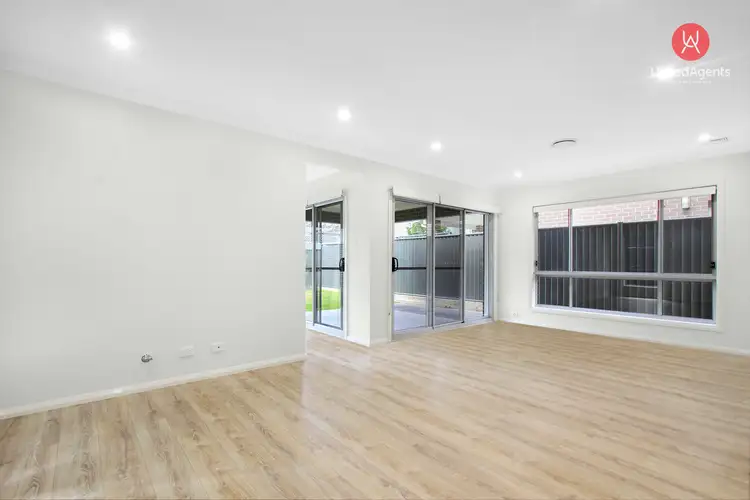 Third view of Homely house listing, 12 Jamestown Avenue, Denham Court NSW 2565