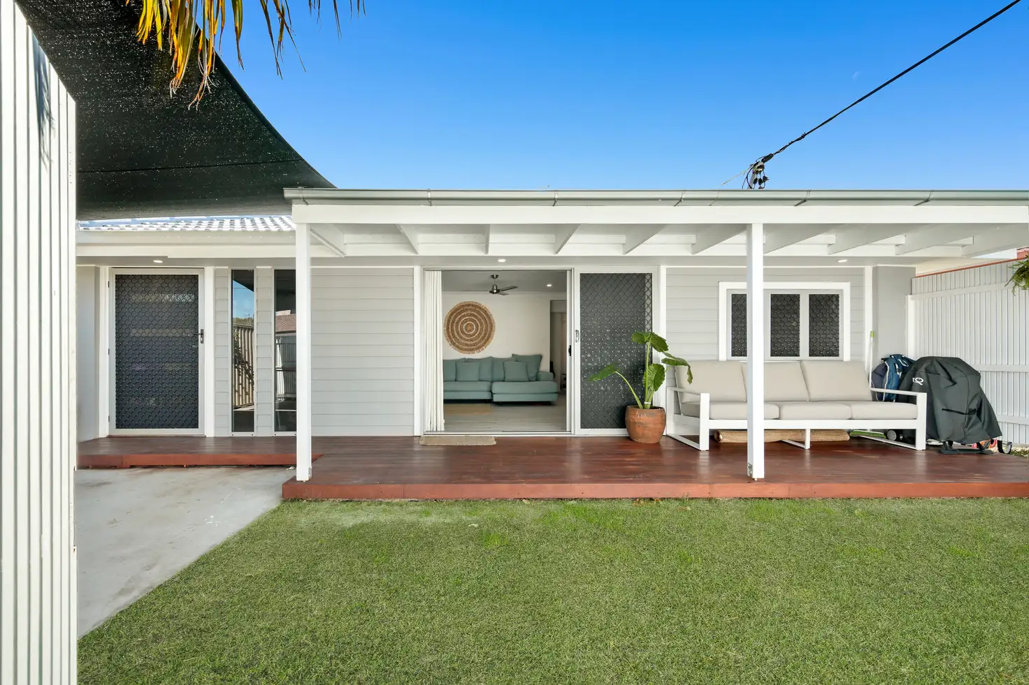 Main view of Homely townhouse listing, 1/23 Victor Avenue, Paradise Point QLD 4216