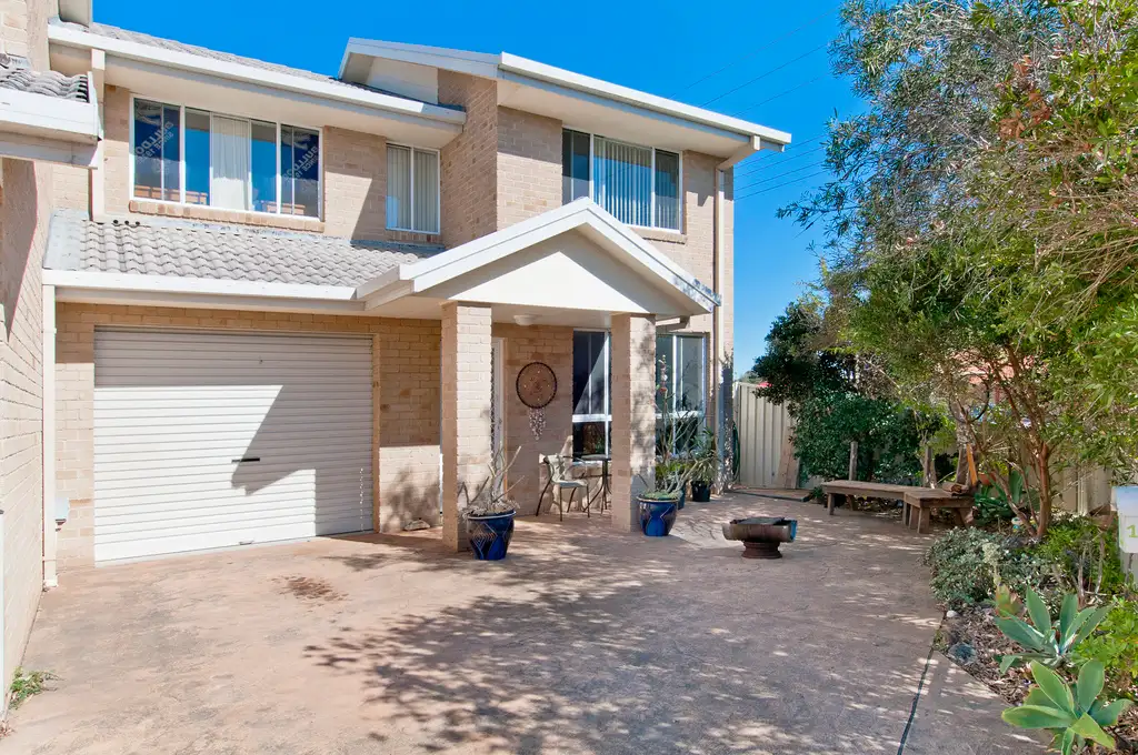 Main view of Homely townhouse listing, 1/1604 Ocean Drive, Lake Cathie NSW 2445