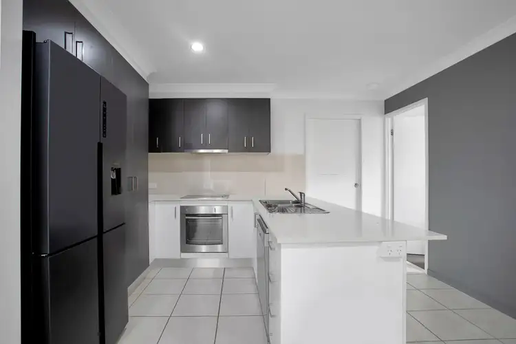 Main view of Homely semi-detached listing, 1/8 Farming Road, Ooralea QLD 4740