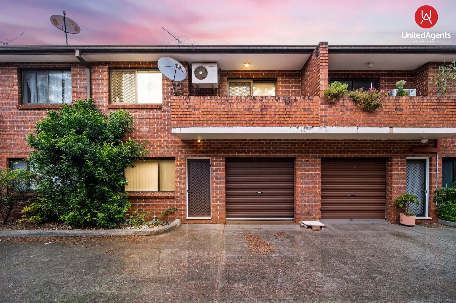 Main view of Homely townhouse listing, 2/24 Railway Parade, Fairfield NSW 2165