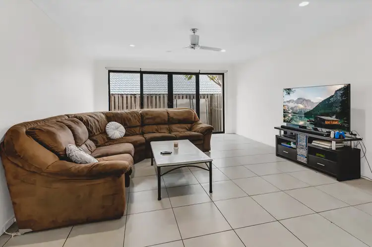 Third view of Homely house listing, 1/15 Barradeen Circuit, Pacific Pines QLD 4211
