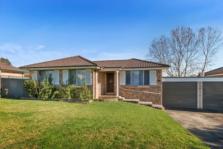 Main view of Homely villa listing, 1/8 Bensley Road, Macquarie Fields NSW 2564