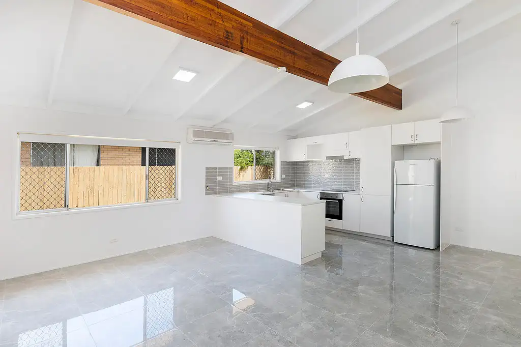 Main view of Homely semi-detached listing, 1/11 Muscovey Avenue, Paradise Point QLD 4216