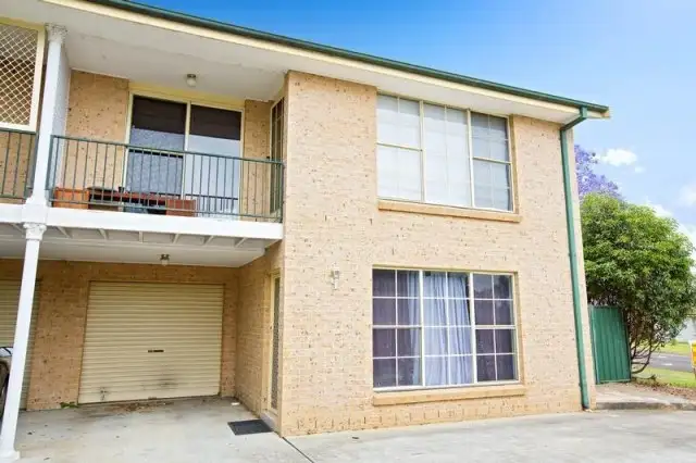 Main view of Homely townhouse listing, 1/12 Kitson Place, Minto NSW 2566