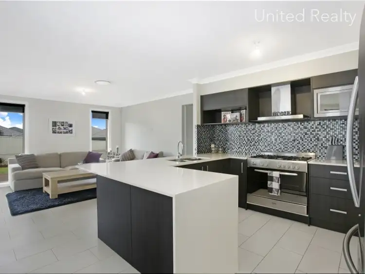Second view of Homely house listing, 38 Moyengully Avenue, Mount Annan NSW 2567