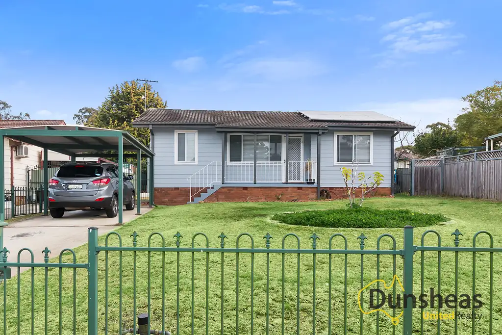 Main view of Homely house listing, 69 Grevillea Crescent, Macquarie Fields NSW 2564
