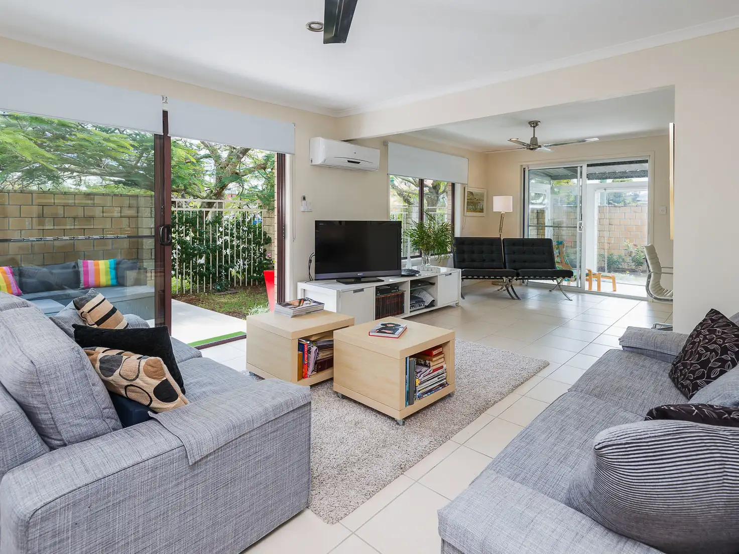 Main view of Homely semi-detached listing, 1/34 Milton Avenue, Paradise Point QLD 4216