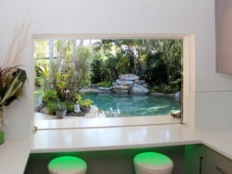 Main view of Homely house listing, 9 Poinsettia St, Holloways Beach QLD 4878