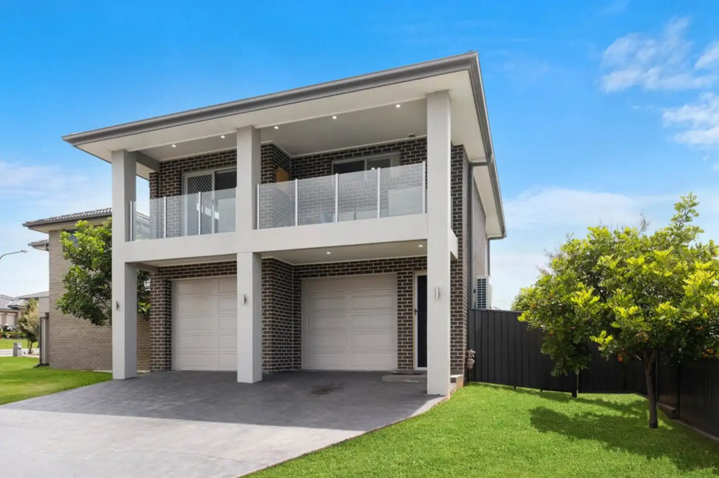 Main view of Homely townhouse listing, 1B Oaklands Circuit, Gregory Hills NSW 2557