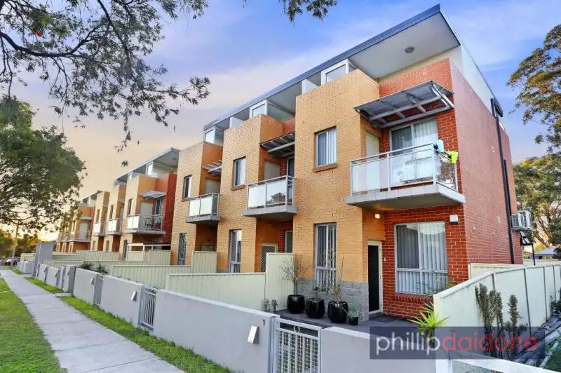 Main view of Homely townhouse listing, 1/17 - 21 Kirkham Road, Auburn NSW 2144