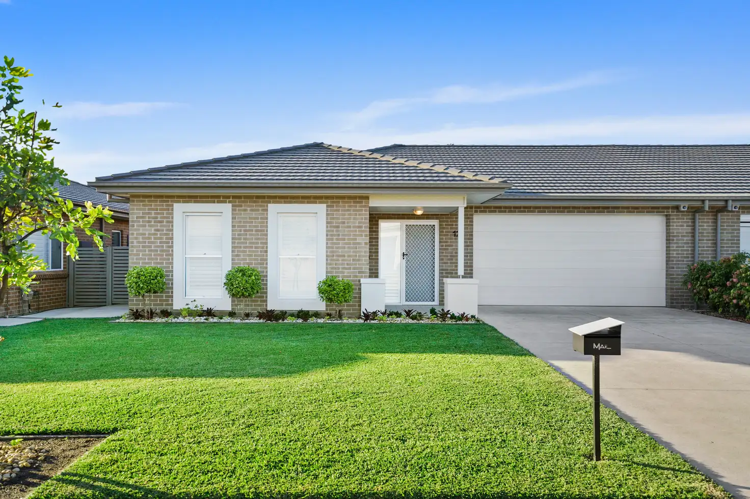 Main view of Homely semi-detached listing, 12 Sugar Glider Way, Fullerton Cove NSW 2318