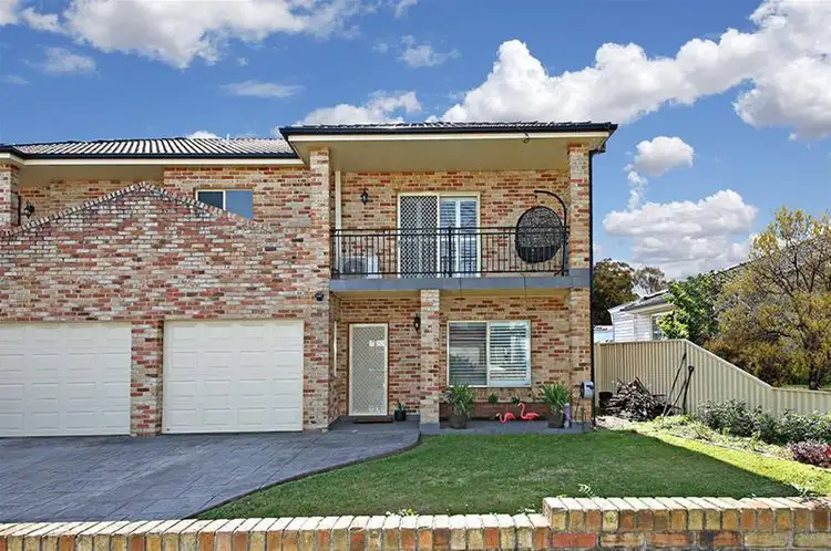 Main view of Homely semi-detached listing, 61 Pozieres Avenue, Milperra NSW 2214