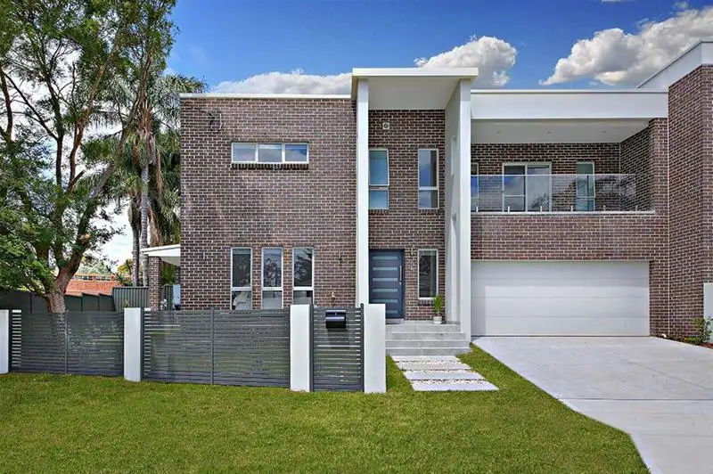 Main view of Homely semi-detached listing, 7 Shari Avenue, Picnic Point NSW 2213