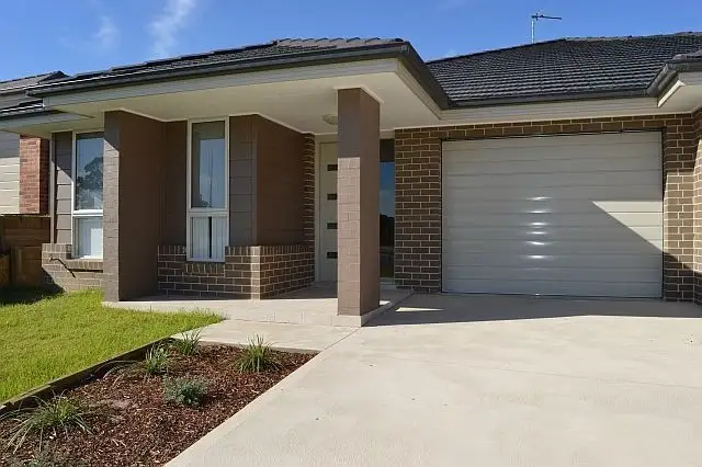 Main view of Homely unit listing, 1/11 Auburn Street, Gillieston Heights NSW 2321