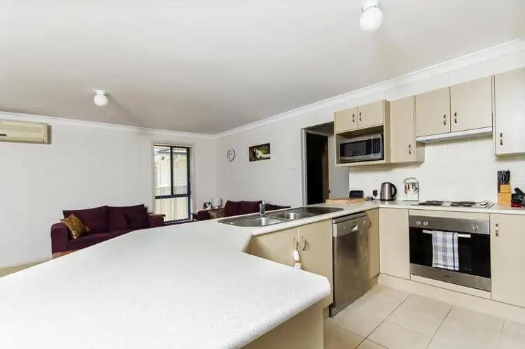 Second view of Homely semi-detached listing, 1/65 Worcester Drive, East Maitland NSW 2323