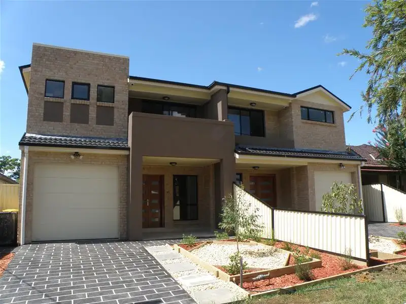 Main view of Homely semi-detached listing, 15 Worsley Road, East Hills NSW 2213