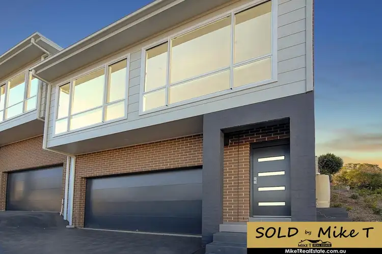 Main view of Homely semi-detached listing, 1/45 Sorenson Drive, Figtree NSW 2525