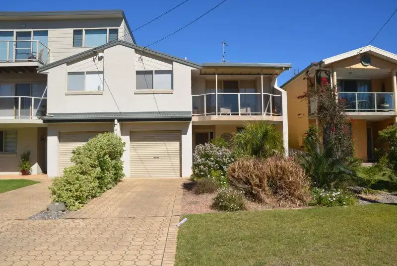 Main view of Homely townhouse listing, 1/91 Coronation Drive, Broulee NSW 2537