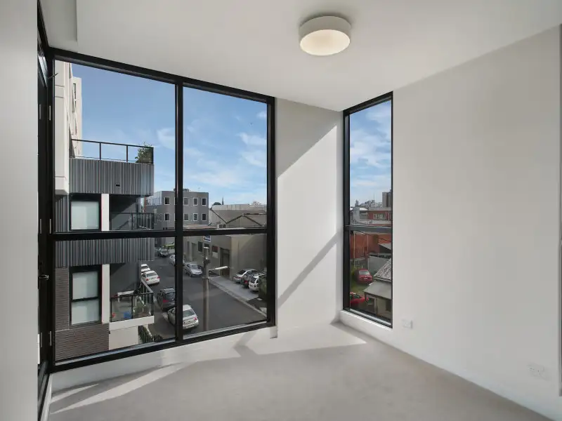 Main view of Homely apartment listing, E221/11 Flockhart St, Abbotsford VIC 3067