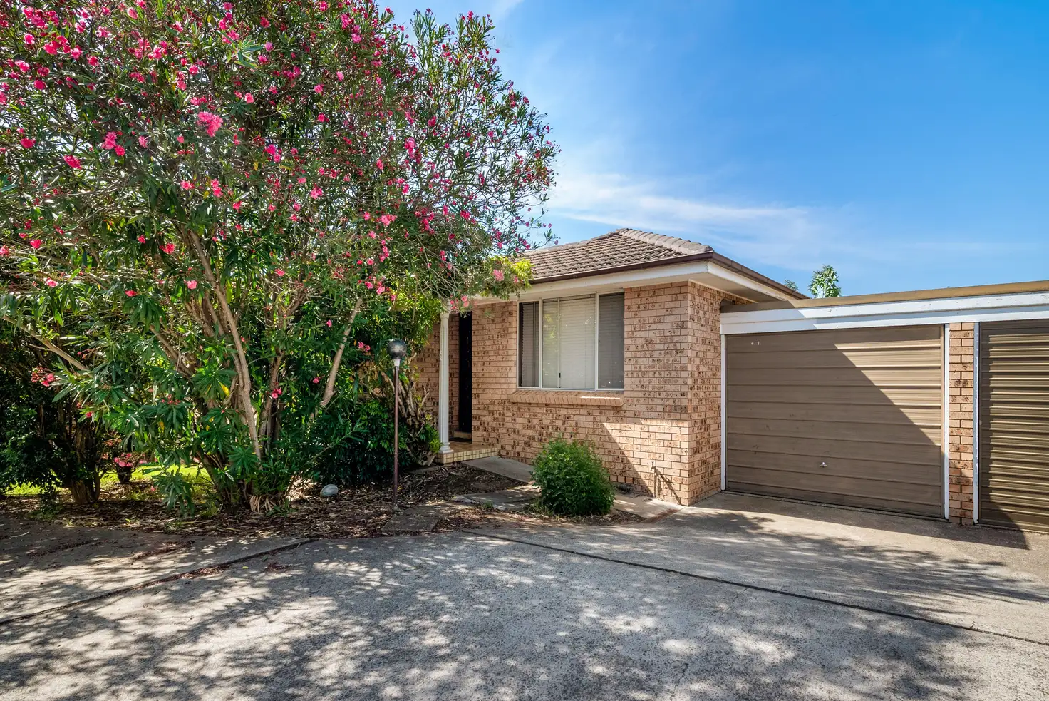Main view of Homely villa listing, 9/8 Bensley Road, Macquarie Fields NSW 2564