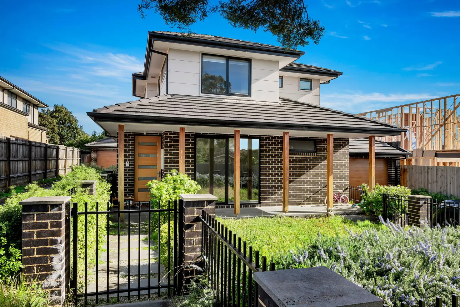 Main view of Homely townhouse listing, 1/15 Cornfield Grove, Box Hill South VIC 3128