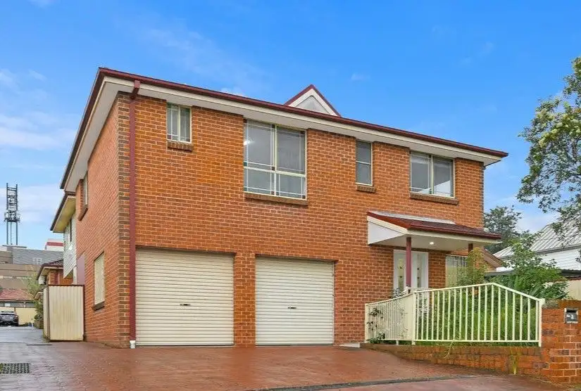 Main view of Homely townhouse listing, 1/31-33 Elsham Road, Auburn NSW 2144