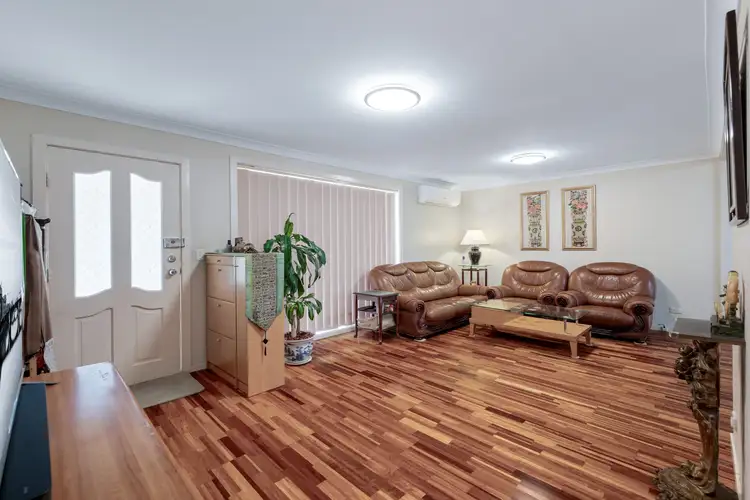 Main view of Homely villa listing, 2/8A Atchison Road, Macquarie Fields NSW 2564