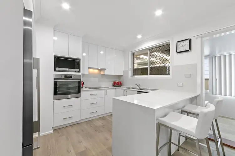 Main view of Homely villa listing, 1/30 Natuna Avenue, Budgewoi NSW 2262