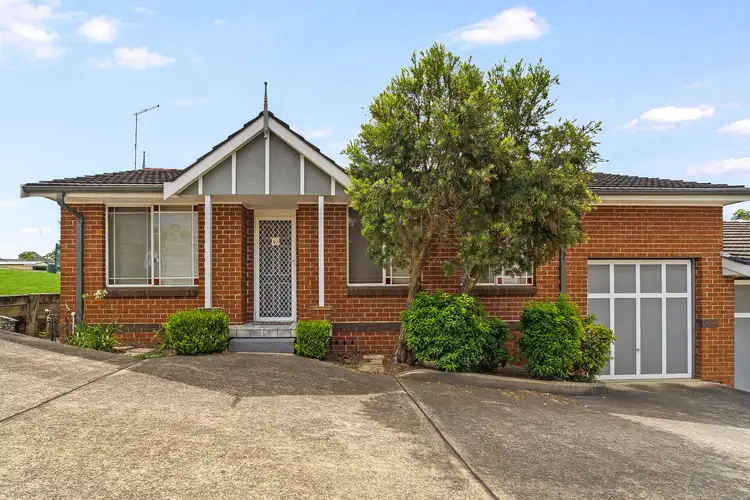 Main view of Homely villa listing, 1/14 Westmoreland Road, Minto NSW 2566