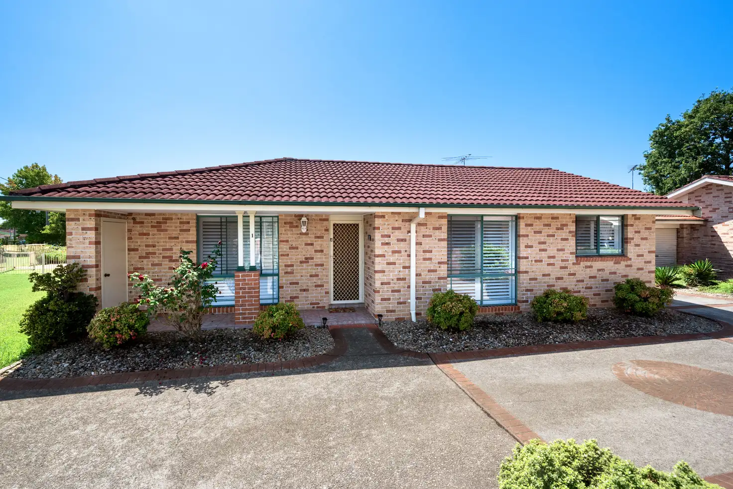 Main view of Homely villa listing, 1/17 Pritchard Road, Macquarie Fields NSW 2564