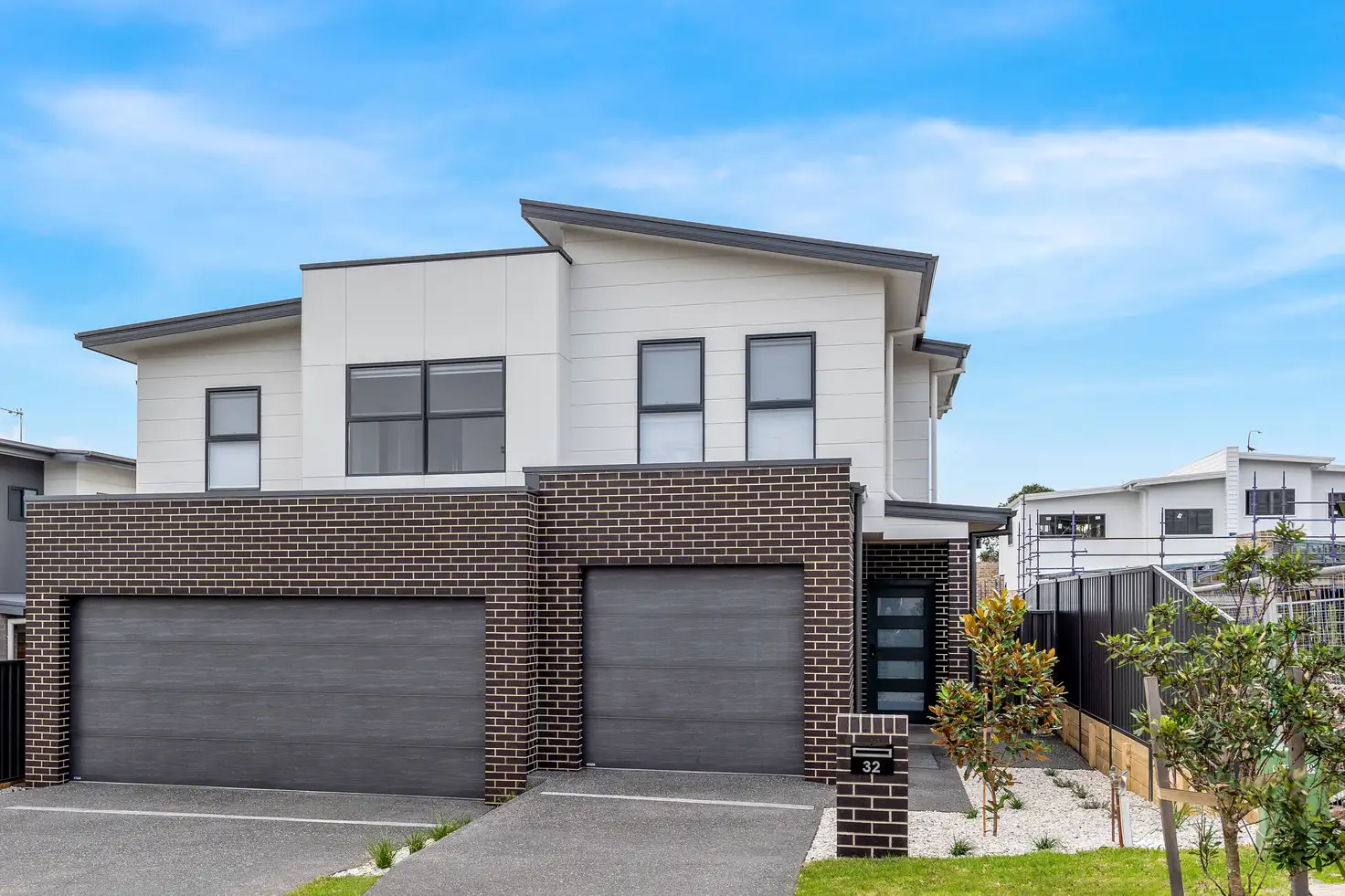 Main view of Homely semi-detached listing, 32 Galactic Drive, Dunmore NSW 2529