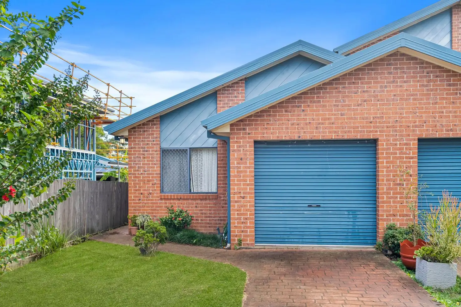 Main view of Homely semi-detached listing, 4/14 Westringia Place, Macquarie Fields NSW 2564