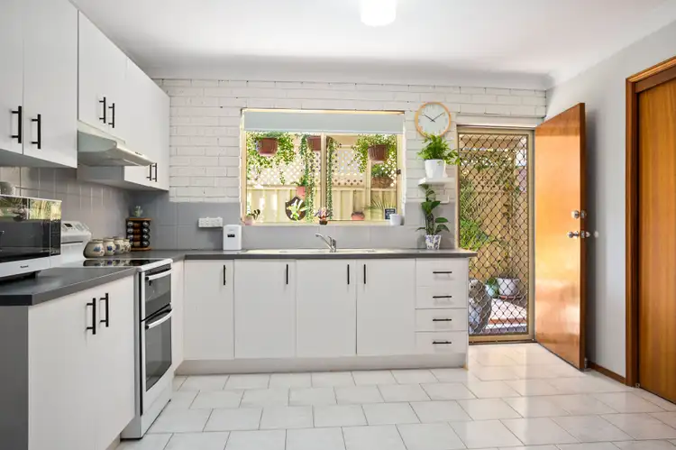 Third view of Homely townhouse listing, 7/11 Commerce Drive, Lake Illawarra NSW 2528