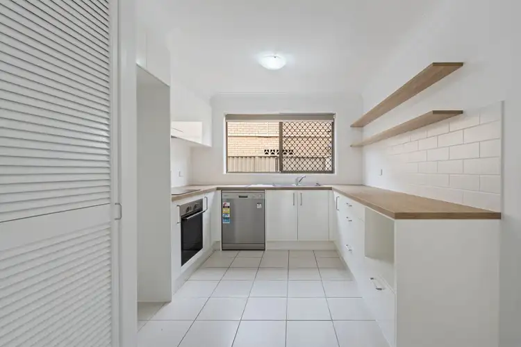 Main view of Homely townhouse listing, 3/4 Angie Court, Mermaid Waters QLD 4218