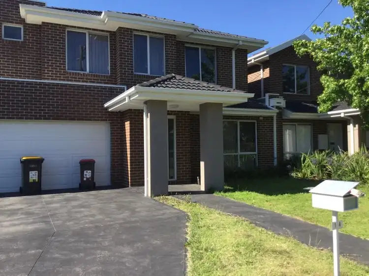 Main view of Homely townhouse listing, 1A Tamala Avenue, Notting Hill VIC 3168