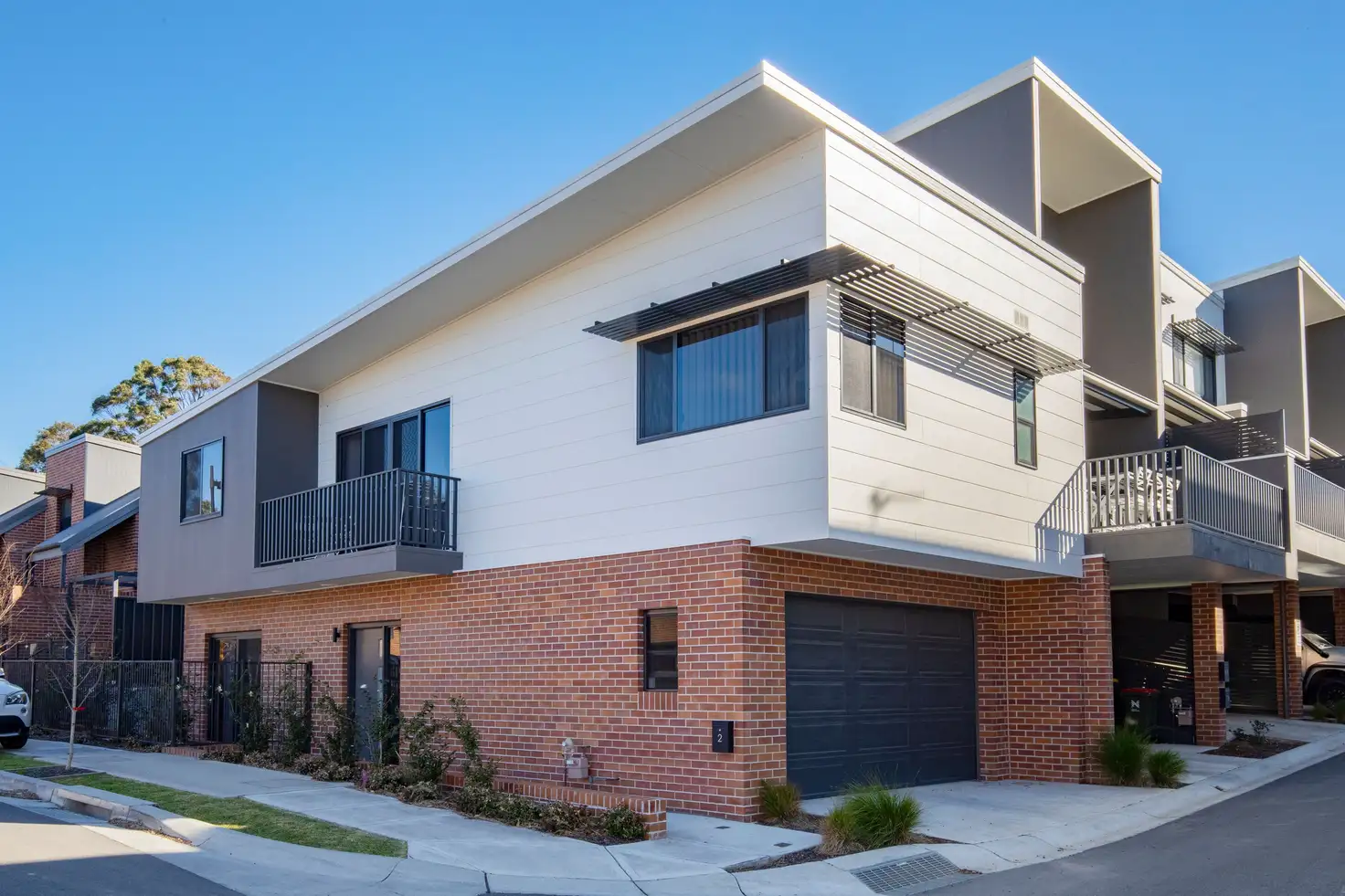 Main view of Homely townhouse listing, 2 Cassine Boulevard, Waratah West NSW 2298