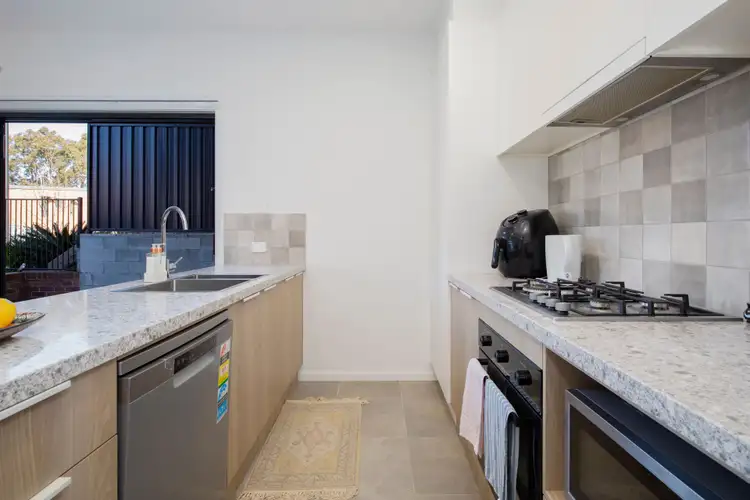 Third view of Homely townhouse listing, 2 Cassine Boulevard, Waratah West NSW 2298